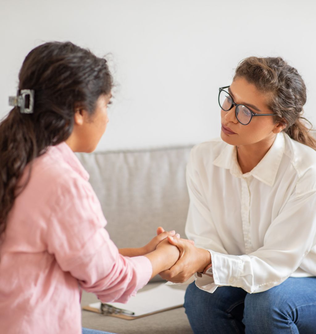 Woman Offering Support and Comfort to Another Woman