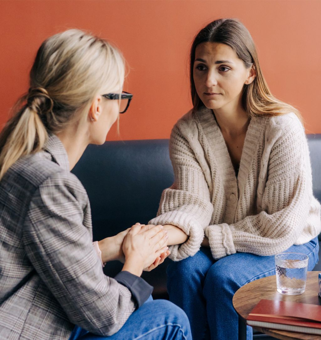 Woman Psychologist Holding the Hand of a Client